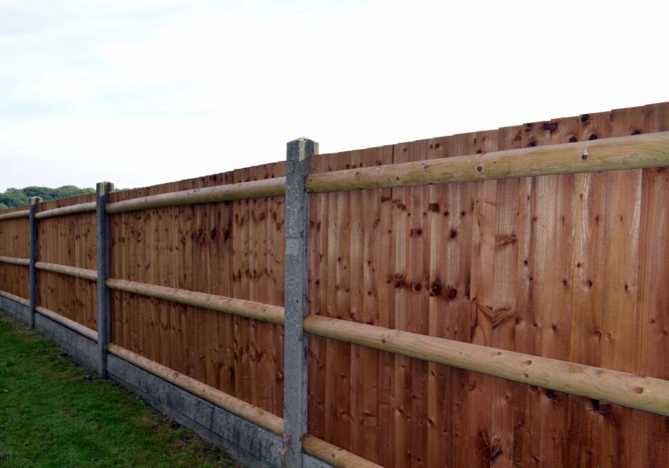 finished house wood fence